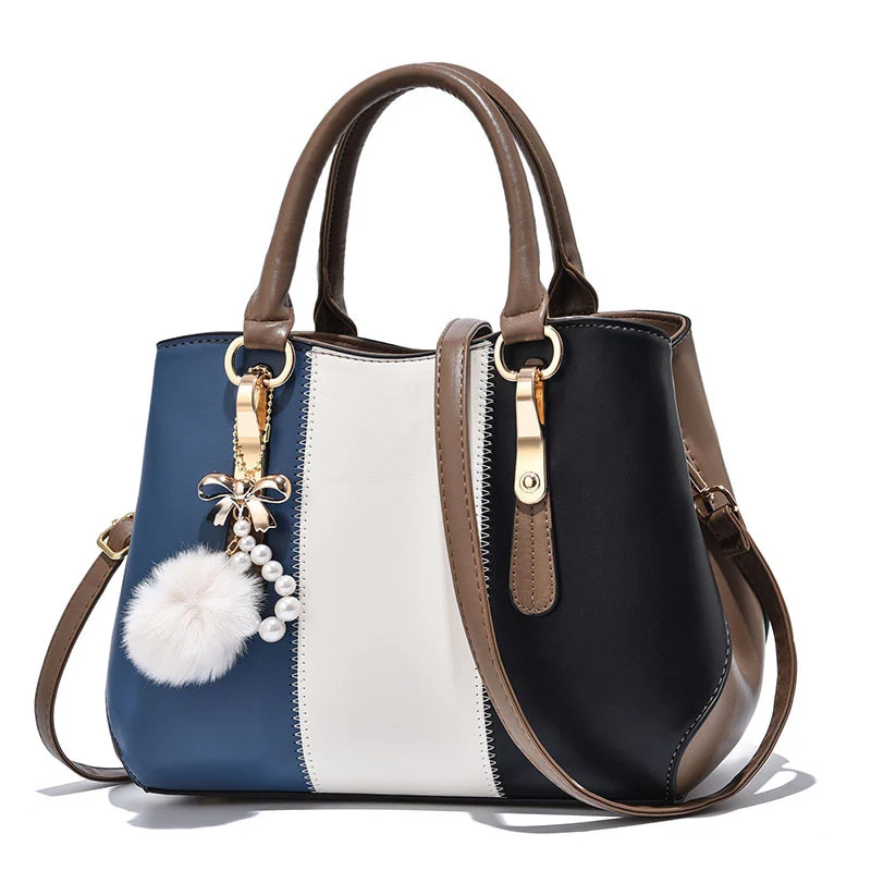 Elegante mehrfarbige Handtasche Skanto