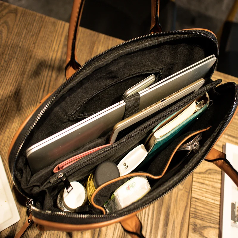 Elegante Handtasche mit trendigem Schal Skanto