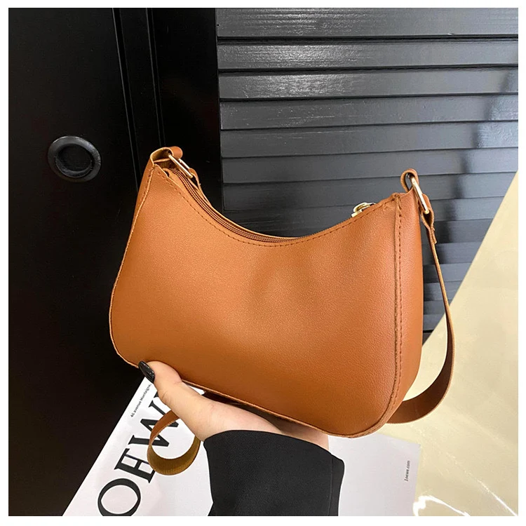 Elegante Handtasche im Wellendesign Skanto