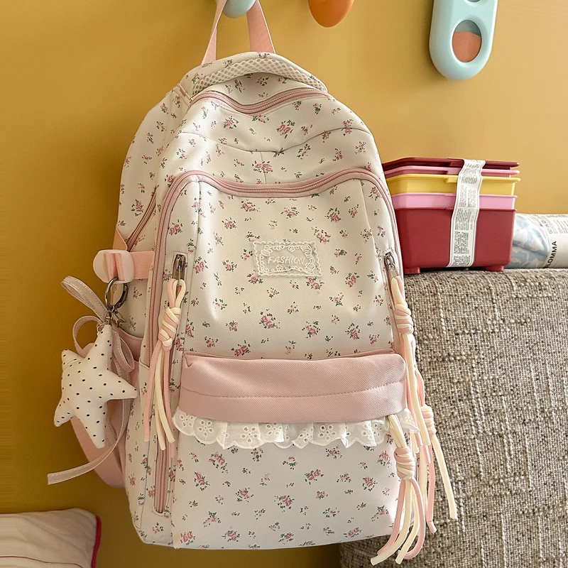 Eleganter Schulrucksack mit Blumendruck und mehreren Fächern