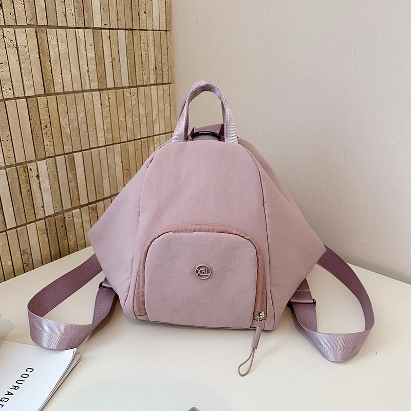 Moderner dreieckiger Alltags-Schulrucksack