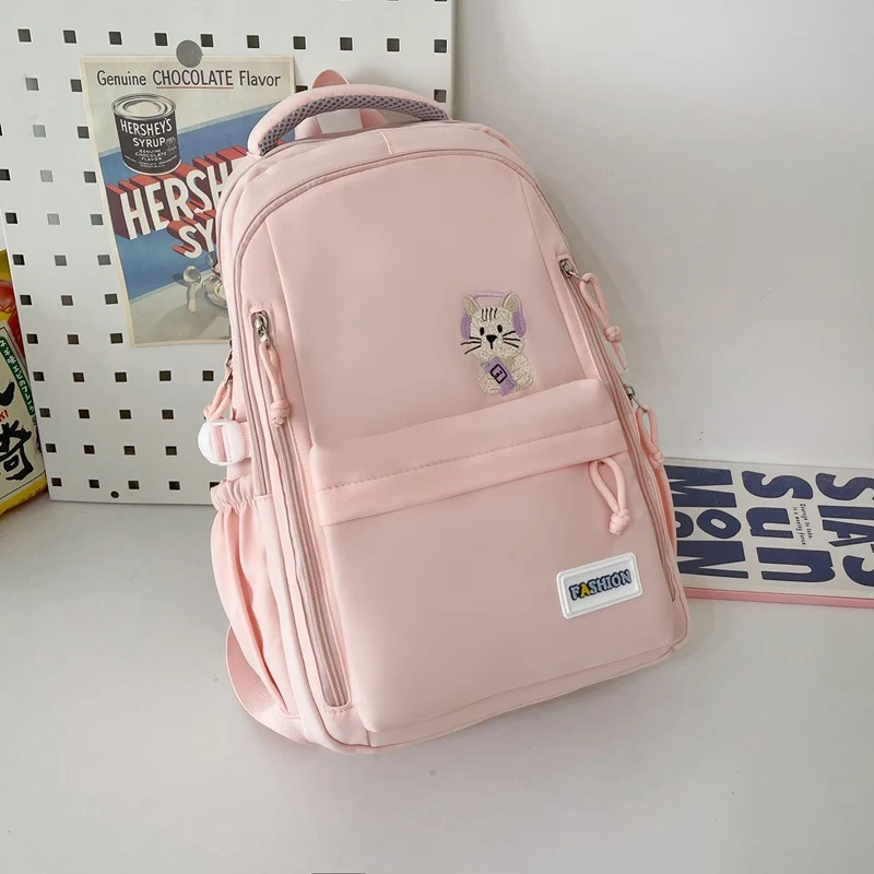 Niedliche Schultasche mit gesticktem Tiermotiv