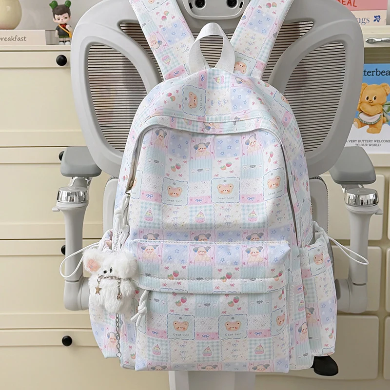 Niedlicher Schulrucksack mit Cartoon-Muster