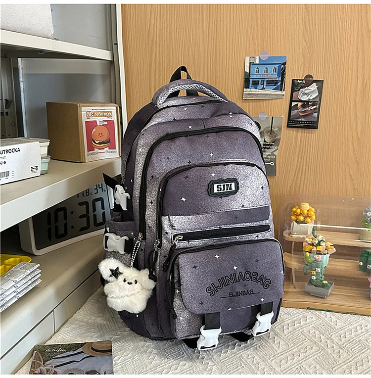 Schulrucksack mit Galaxie-Design und vielen Fächern