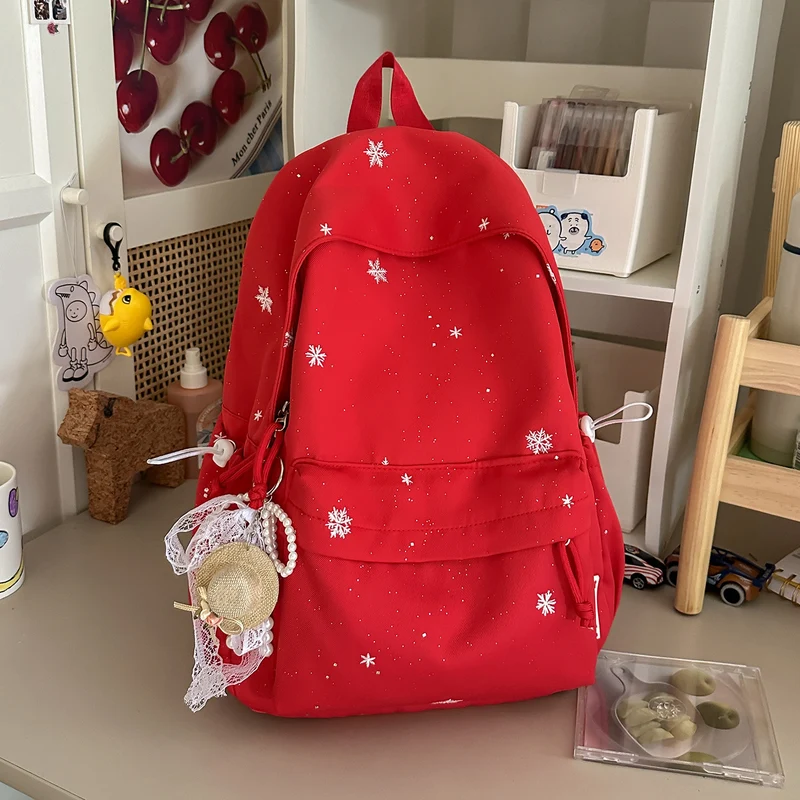 Lustiger Schulrucksack mit Themen-Verzierungen