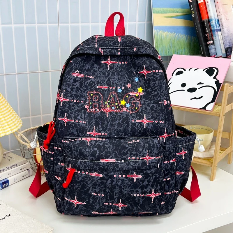 Lustiger gemusterter Schulrucksack