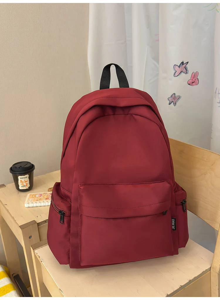 Minimalistischer multifunktionaler Schulrucksack