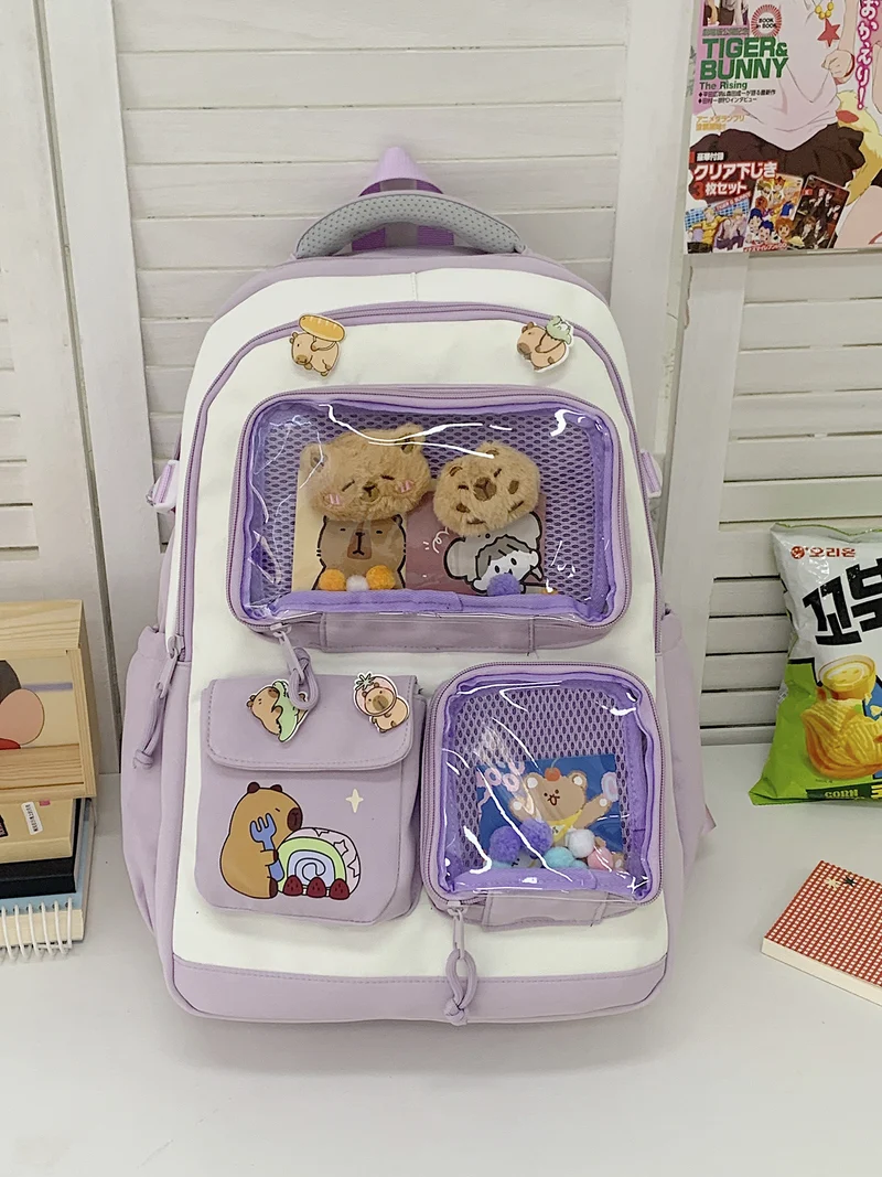 Niedlicher Schulrucksack mit Charakter-Motiv und mehreren Fächern