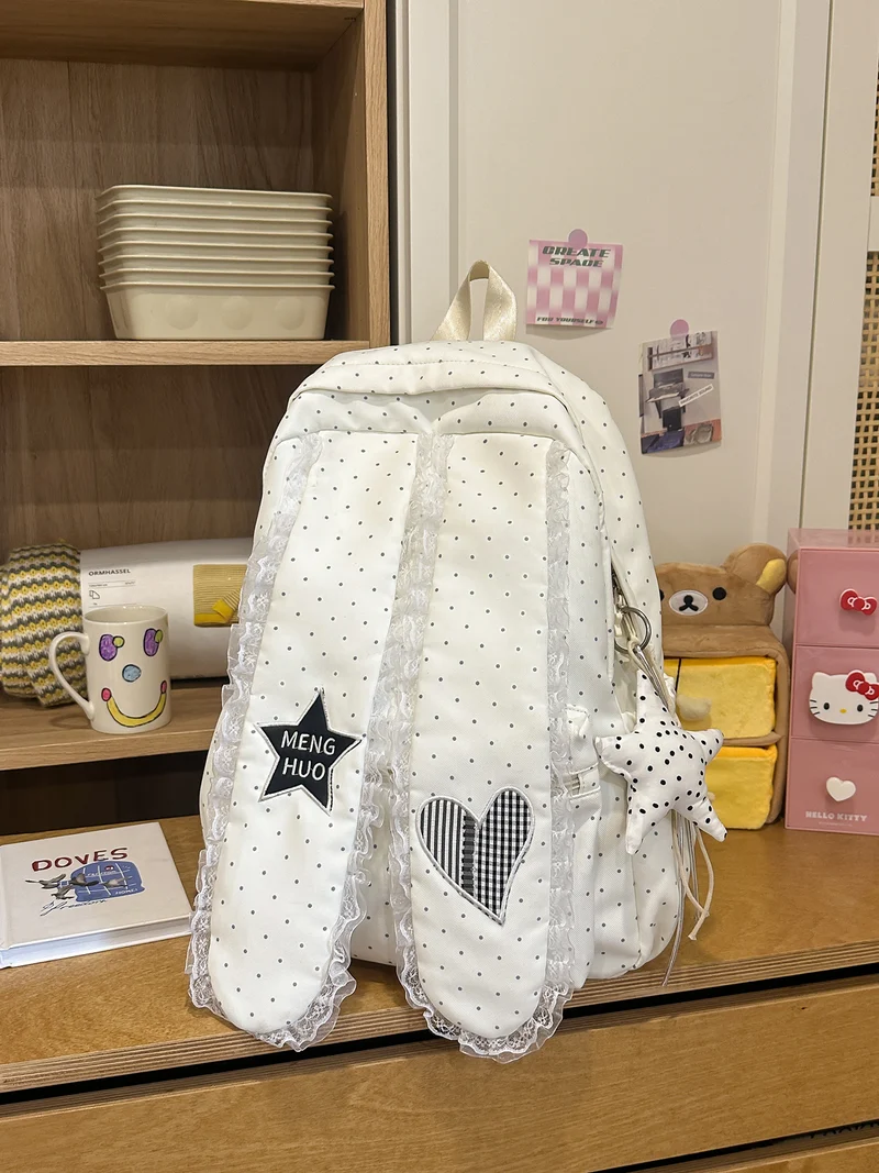 Dekorative Schultasche mit Spitzenbesatz