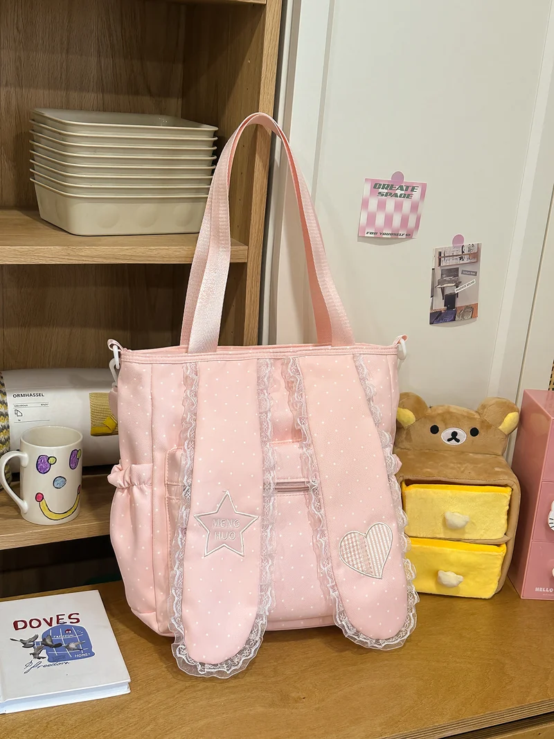 Dekorative Schultasche mit Spitzenbesatz