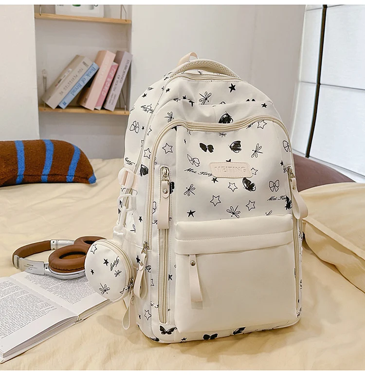 Schulrucksack mit Blumenmuster und mehreren Taschen