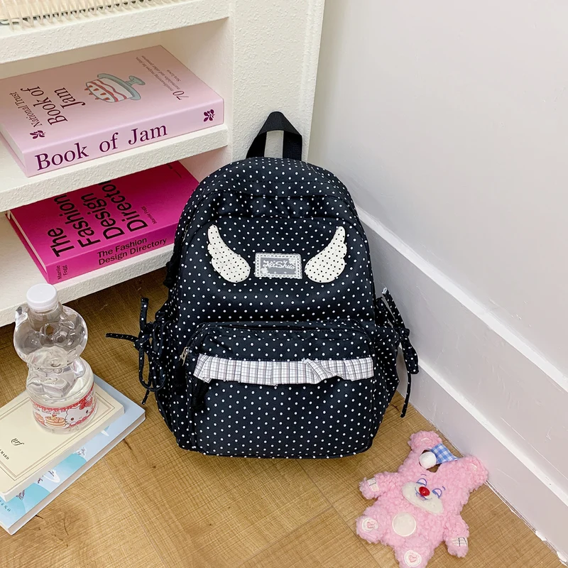 Schultasche mit Polka Dots und Charakterdesign