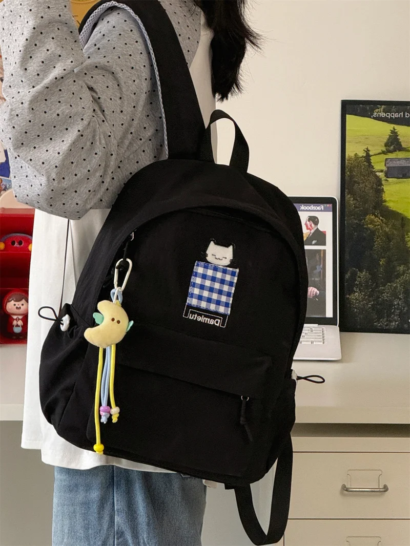 Kompakter Schulrucksack mit Katzenstickerei