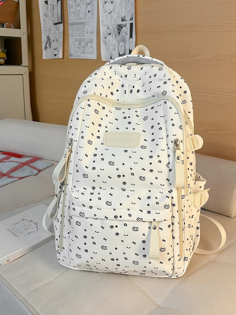 Niedlicher Schulrucksack mit Charakter-Applikationen