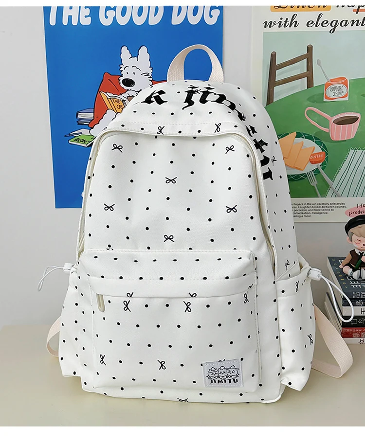 Klassischer gepunkteter Schulrucksack