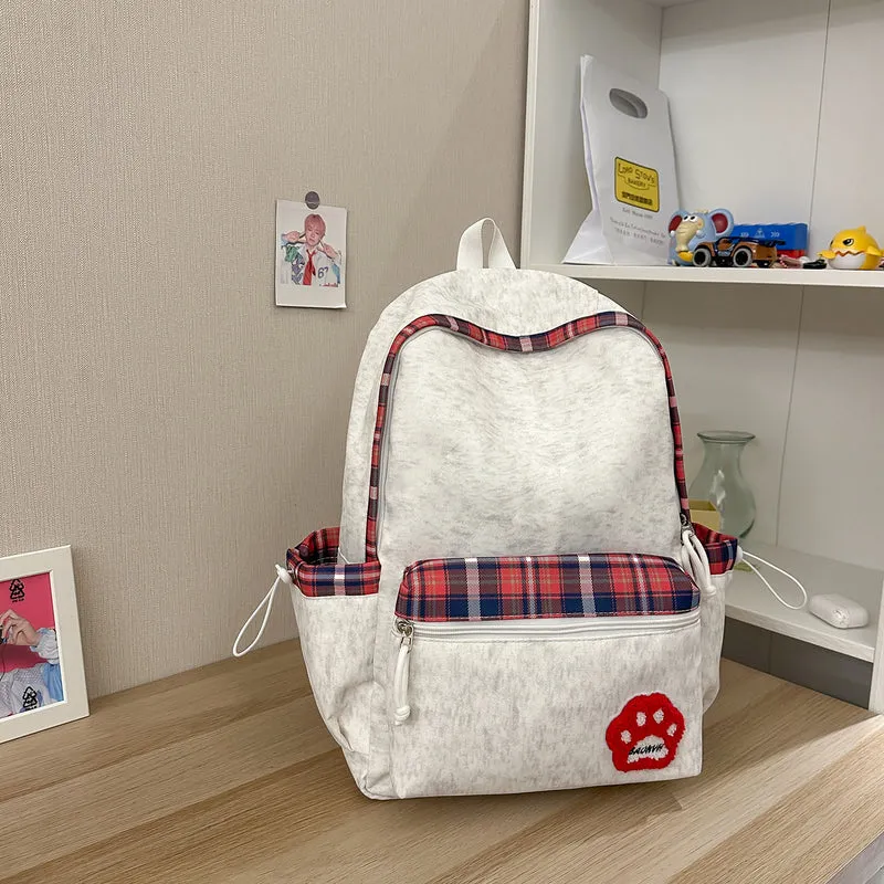 Lässiger karierter Schulrucksack