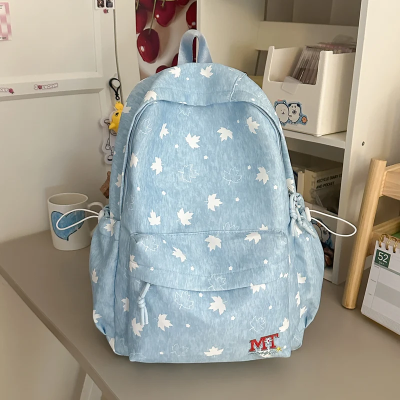 Moderner Schulrucksack mit Blattmuster