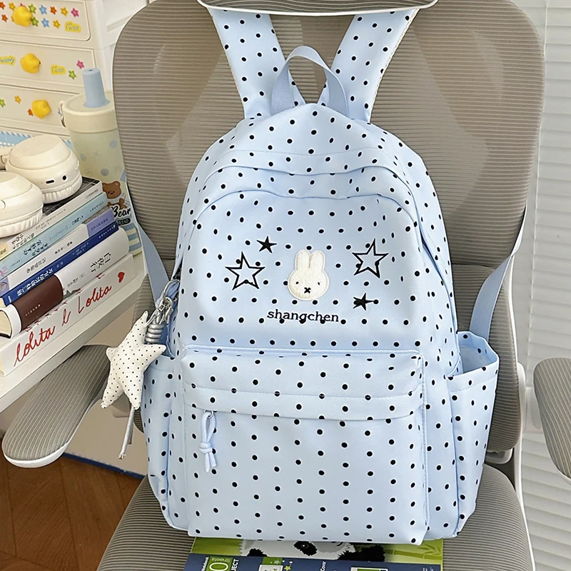 Niedlicher gemusterter Schulrucksack