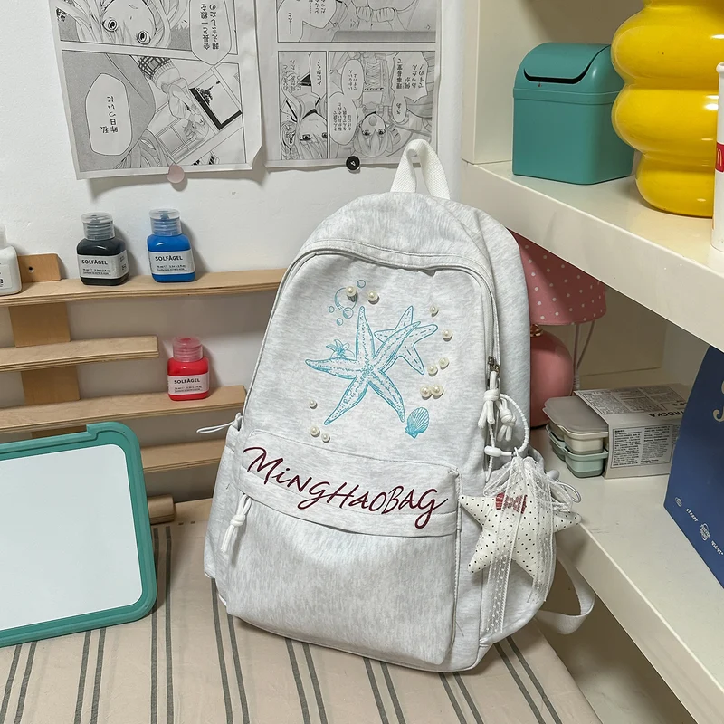 Bestickter Schulrucksack mit Seestern-Design