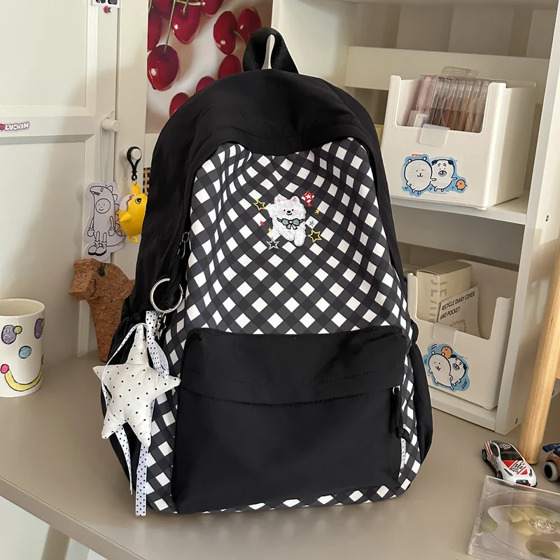 Lustiger gemusterter Schulrucksack