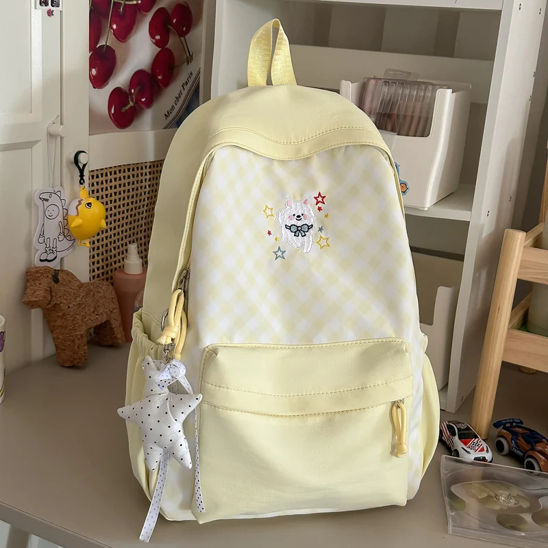 Lustiger gemusterter Schulrucksack