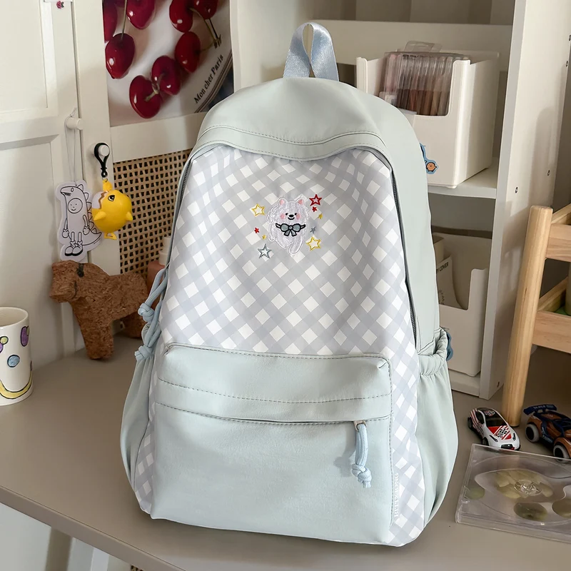 Lustiger gemusterter Schulrucksack