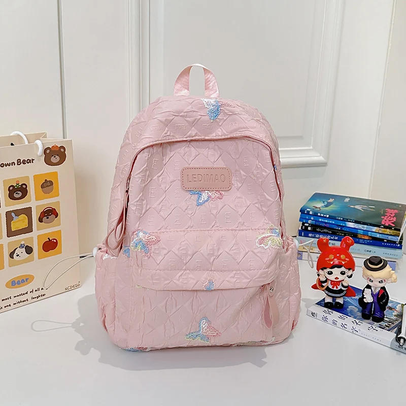 Bestickter Schulrucksack mit Blumenmotiv