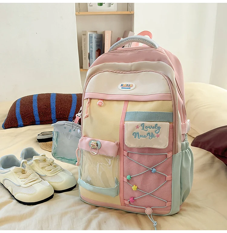 Schulrucksack mit Farbblock-Design und mehreren Taschen