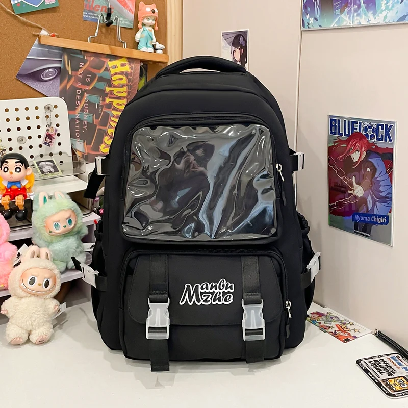 Schulrucksack mit transparentem Fach und mehreren Taschen