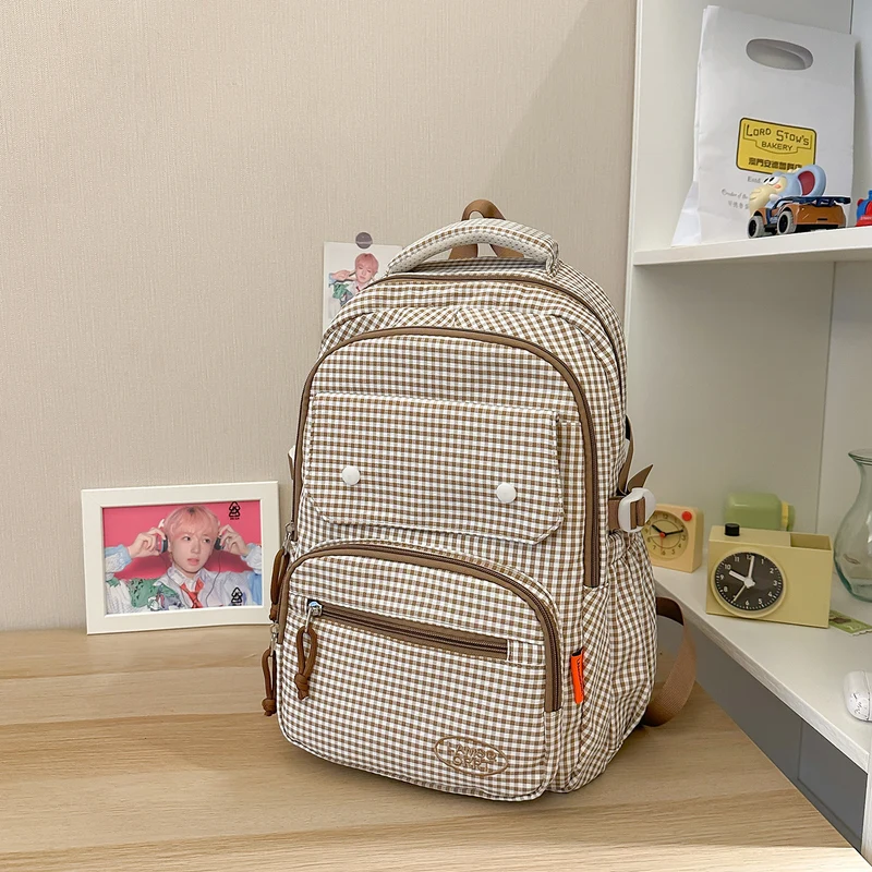 Multifunktionaler Schulrucksack mit Karomuster