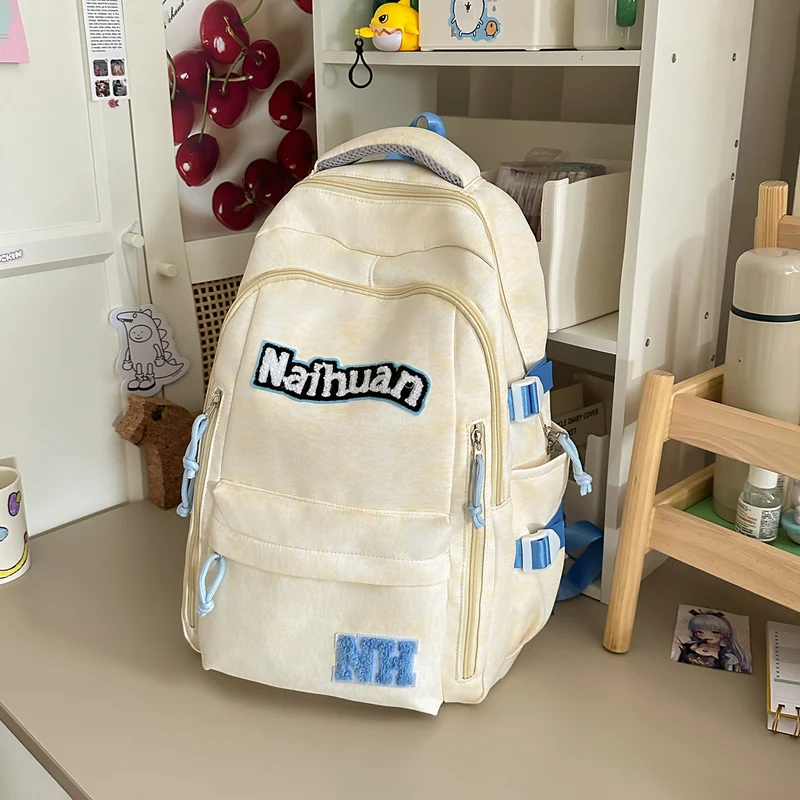 Vielseitiger bestickter Schulrucksack