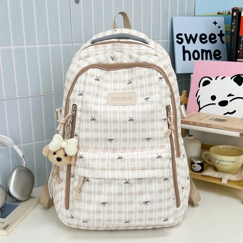 Süßer Schulrucksack mit Schleifenmuster