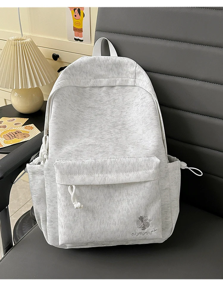 Stylischer Schulrucksack mit Blumenstickerei