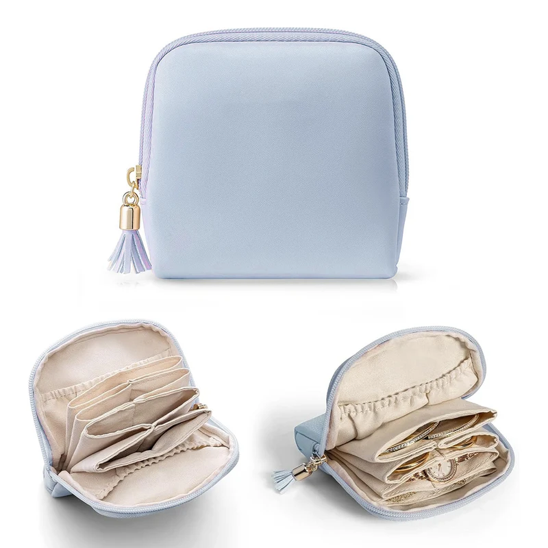 Kosmetik-Organizer mit strukturiertem Innenraum und eleganter Quaste Skanto