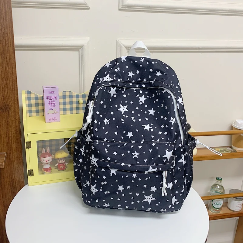 Rucksack Skanto mit Sternenprint und vielen Fächern