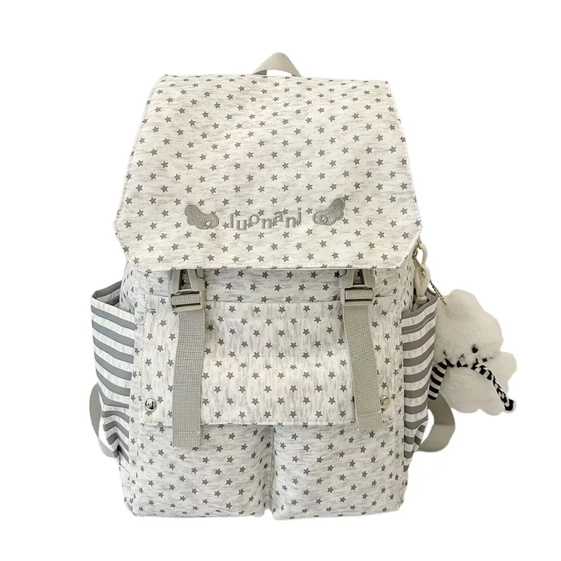 Rucksack Skanto mit Sternenmuster und vielen Taschen