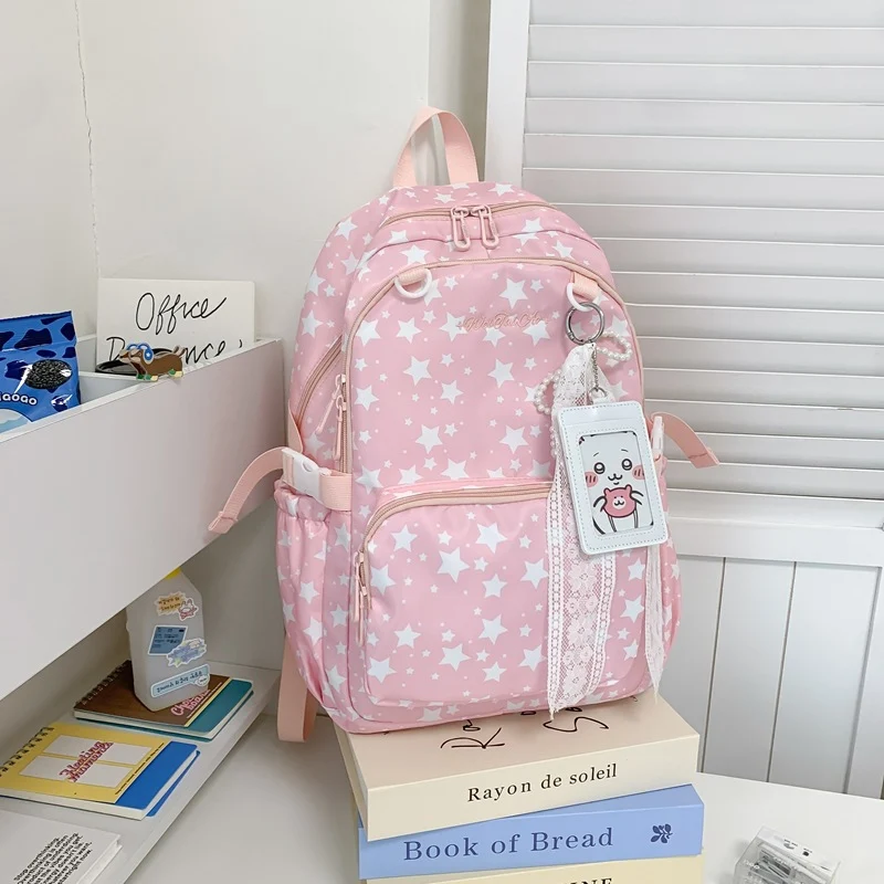 Rucksack Skanto mit Sternenmuster und vielen Taschen