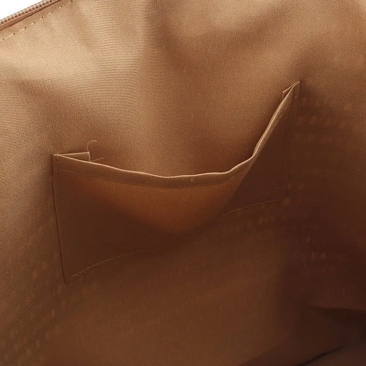 Geräumige Clutch aus geflochtenem Naturmaterial mit dekorativer Quaste Skanto