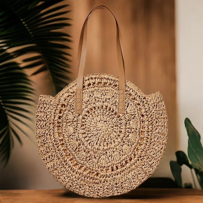 Handgefertigter runder Raffia-Korb mit eleganten Ledergriffen Skanto