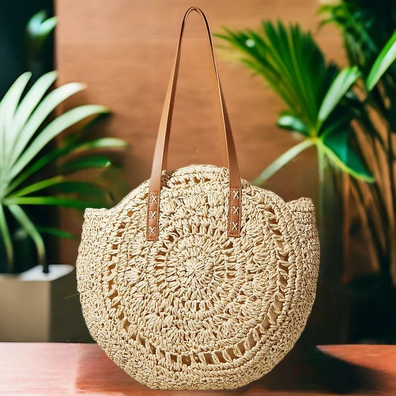 Handgefertigter runder Raffia-Korb mit eleganten Ledergriffen Skanto