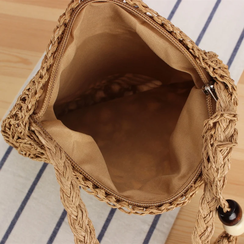 Handtasche aus handgeknüpftem Naturmaterial mit elegantem Fransenanhänger Skanto