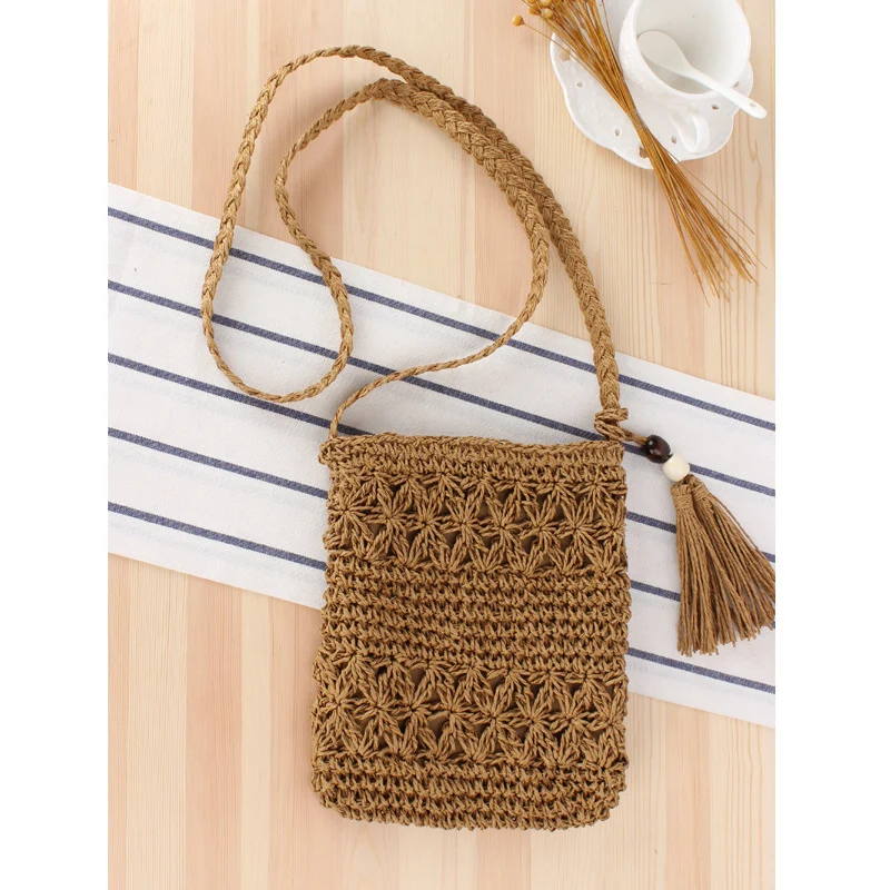 Handtasche aus handgeknüpftem Naturmaterial mit elegantem Fransenanhänger Skanto