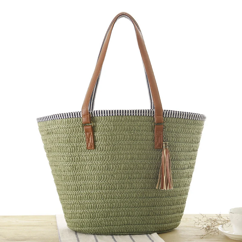 Strandtasche aus handgewebtem Naturmaterial mit elegantem Lederdetail Skanto