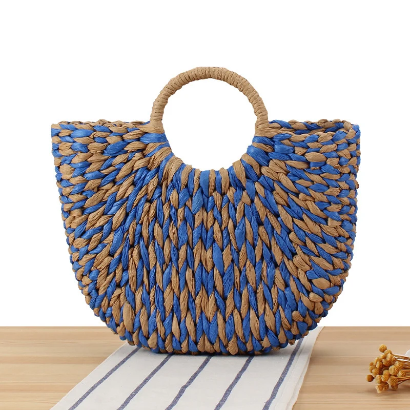 Handtasche aus handgeflochtenen Materialien mit modernem Design Skanto