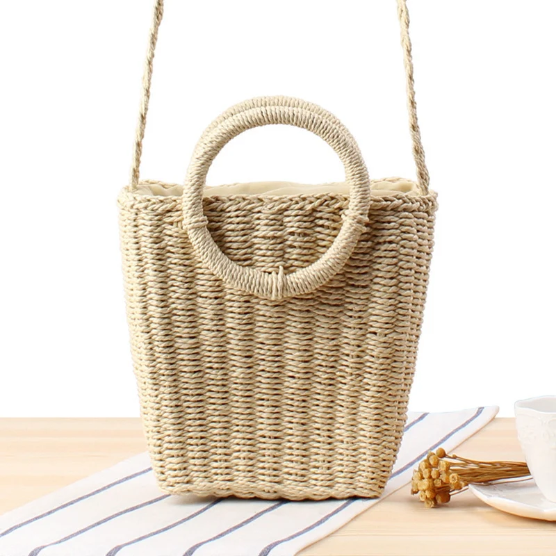 Handtasche aus geflochtenem Naturmaterial mit rundem Griff Skanto