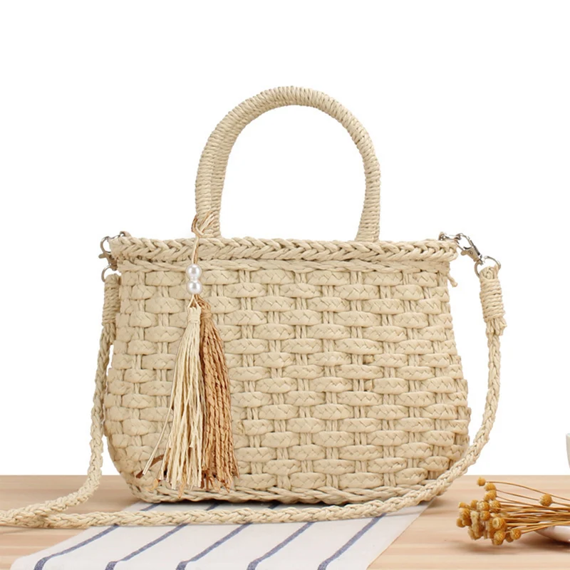 Handtasche aus geflochtenem Naturmaterial mit modischen Fransen Skanto