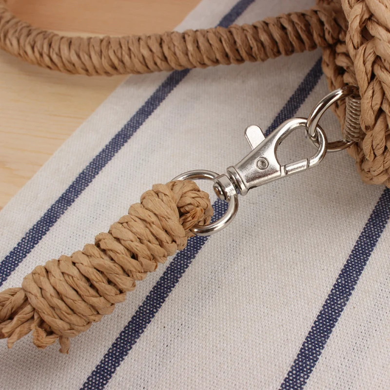 Handtasche aus geflochtenem Naturmaterial mit modischen Fransen Skanto