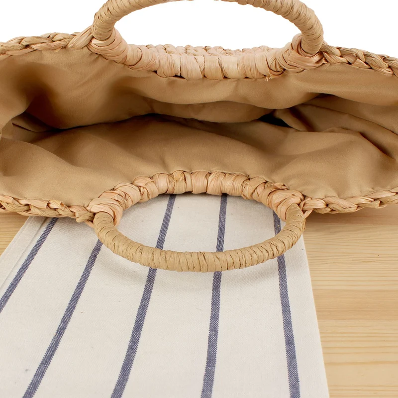 Gewebte Naturmaterial-Handtasche mit elegantem Rundgriff Skanto