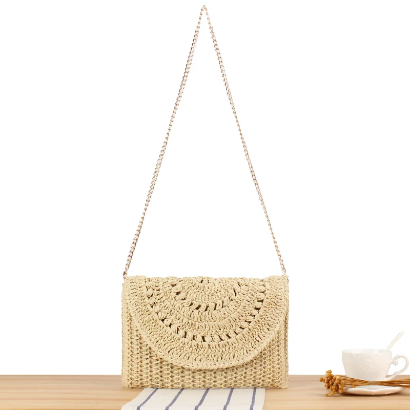 Gewebte Raffia-Handtasche mit elegantem Ketten-Detail Skanto