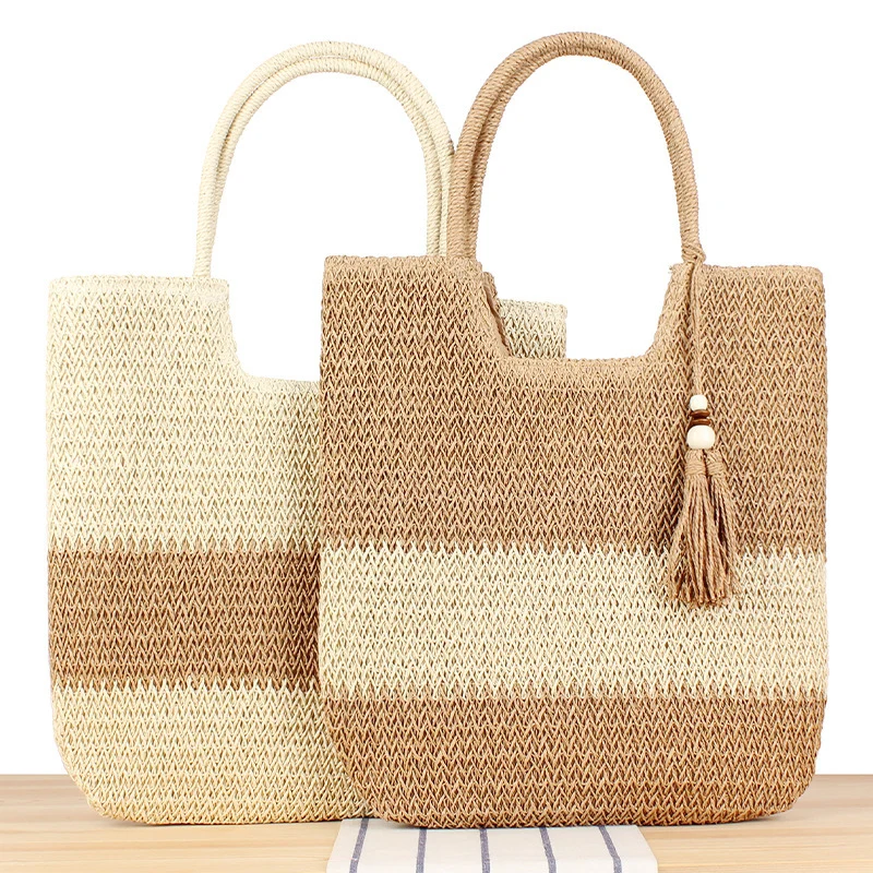 Moderne Strand-Einkaufstasche aus gewebtem Naturmaterial mit Fransen-Details Skanto